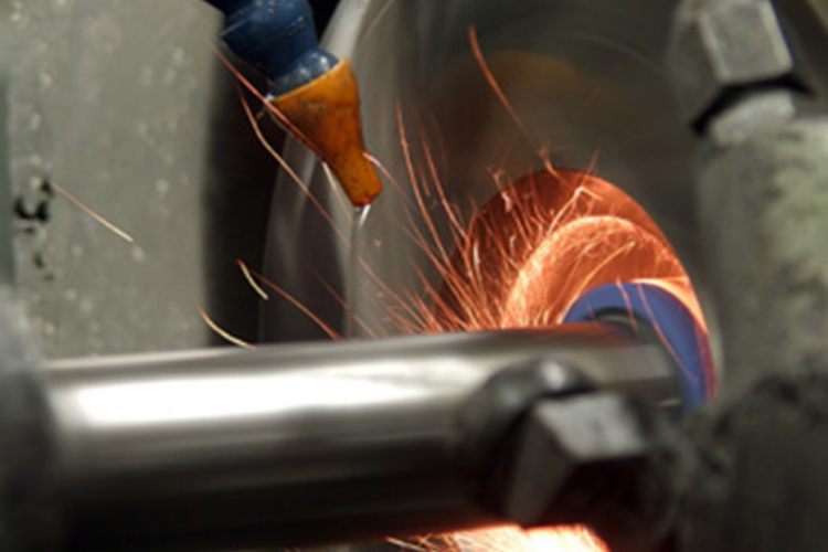 Precision grinding process finishing gear components to tight tolerances for industrial applications